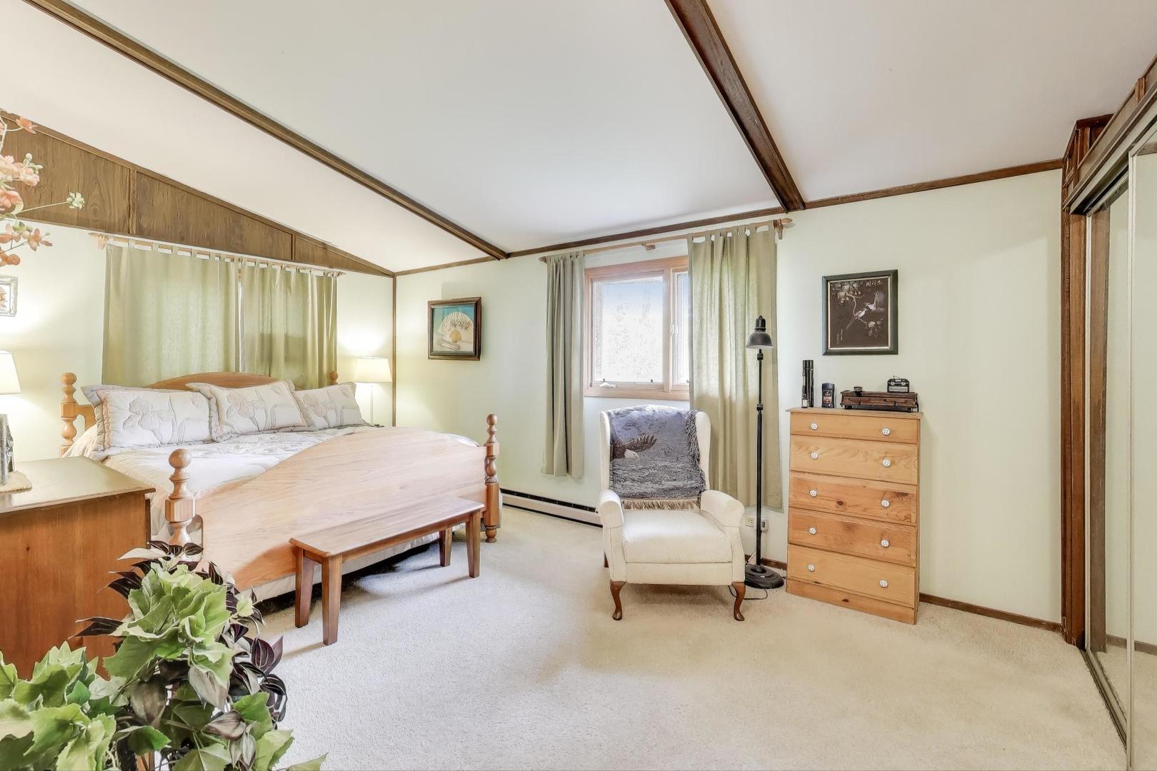 27809 South Will Center Road Monee, IL 60449 - Photo 16 of 47 a bedroom with furniture and a lamp