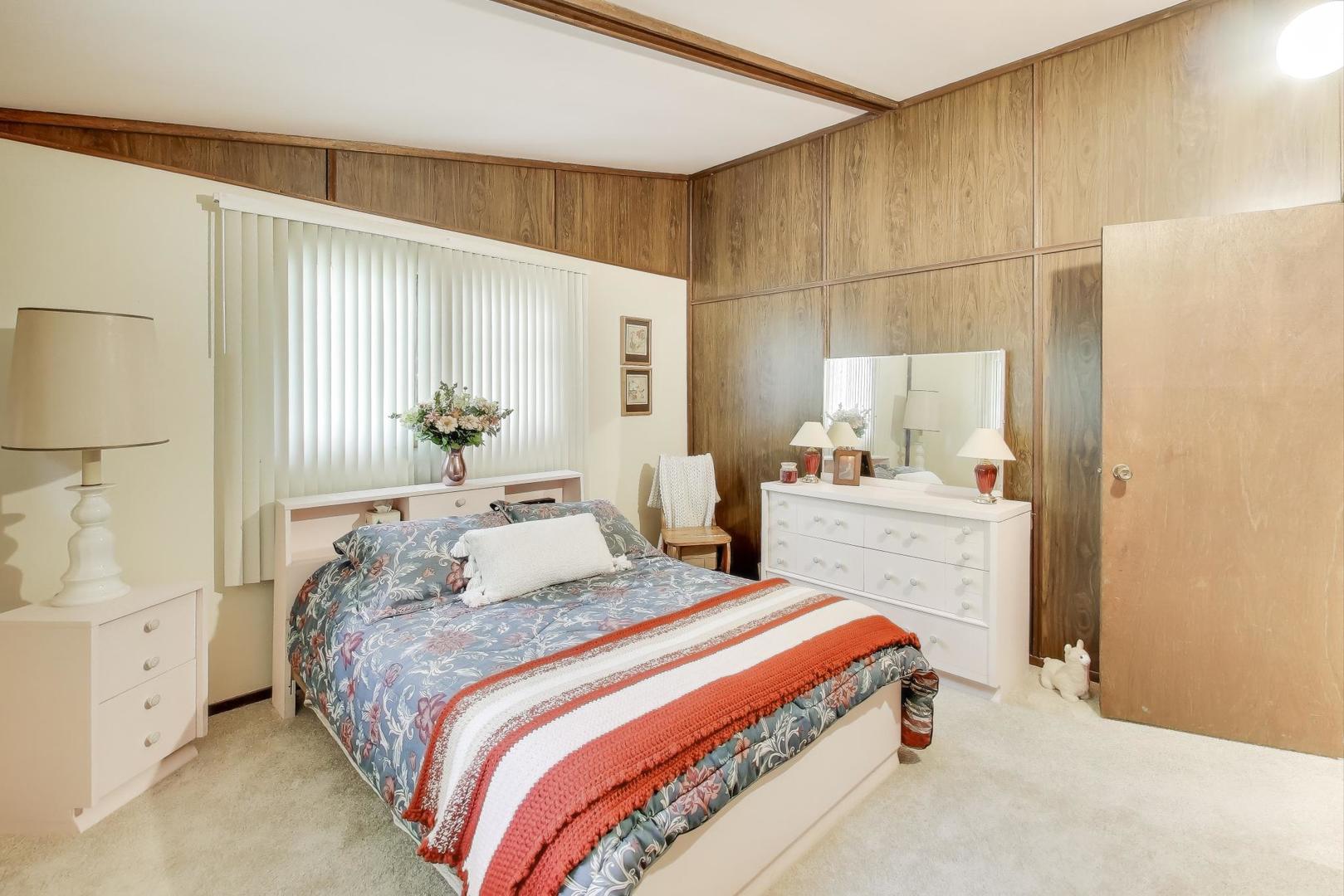 27809 South Will Center Road Monee, IL 60449 - Photo 20 of 47 a bedroom with a bed and a cabinets