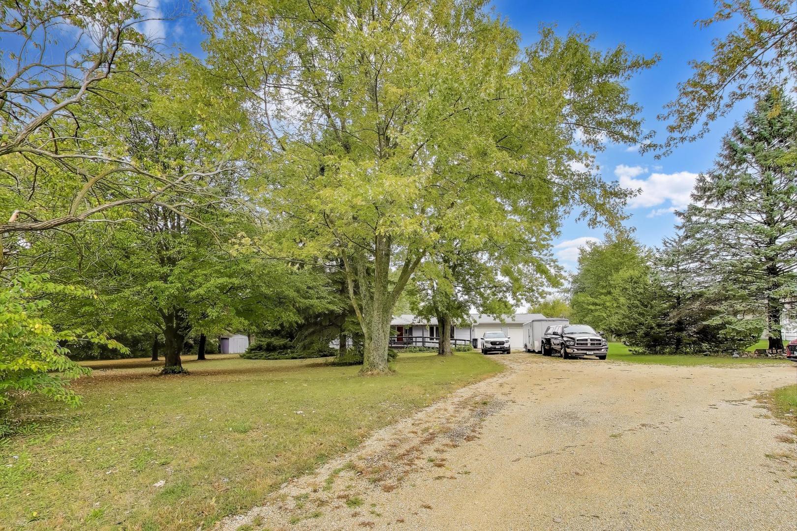 27809 South Will Center Road Monee, IL 60449 - Photo 2 of 47 a view of a street with houses