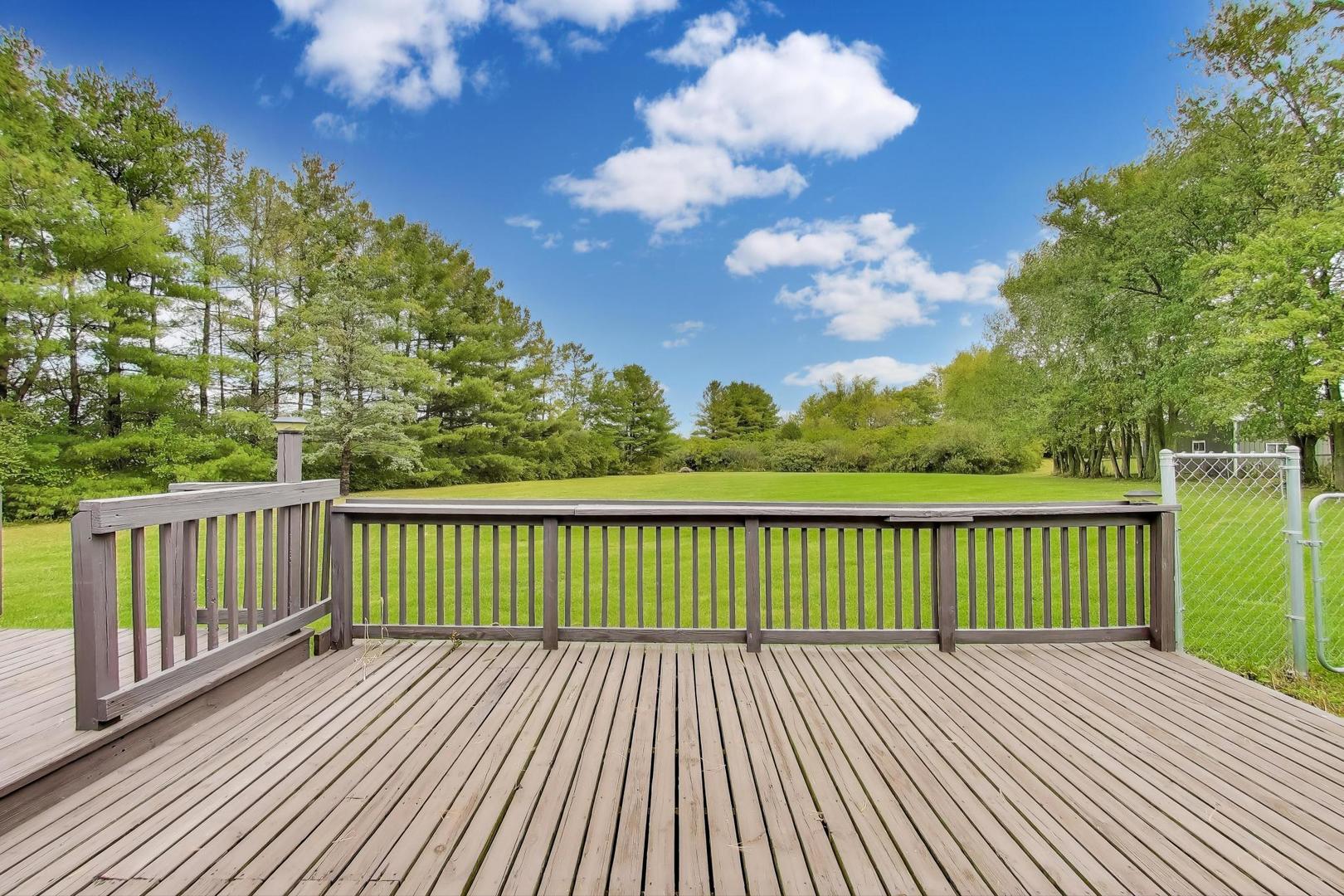 27809 South Will Center Road Monee, IL 60449 - Photo 37 of 47 a view of a balcony with wooden floor