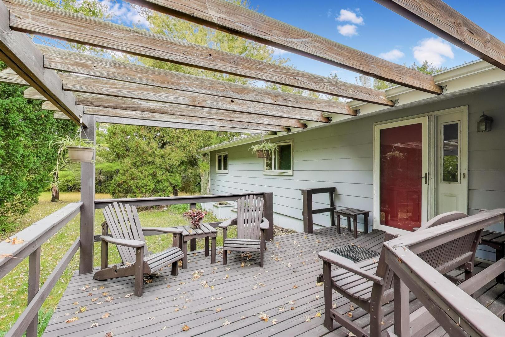27809 South Will Center Road Monee, IL 60449 - Photo 4 of 47 a roof deck with table and chairs