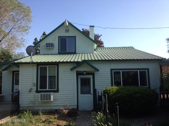 a front view of a house with glass windows
