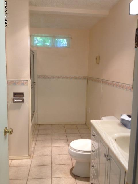 2490 Ashue Road Wapato, WA 98951 - Photo 11 of 11 a bathroom with a sink a toilet and shower