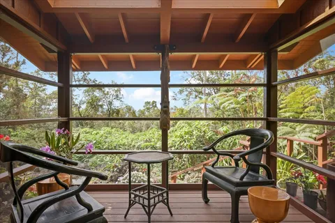 a view of a chairs and table in the room