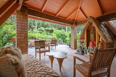 a view of a patio filled with furniture