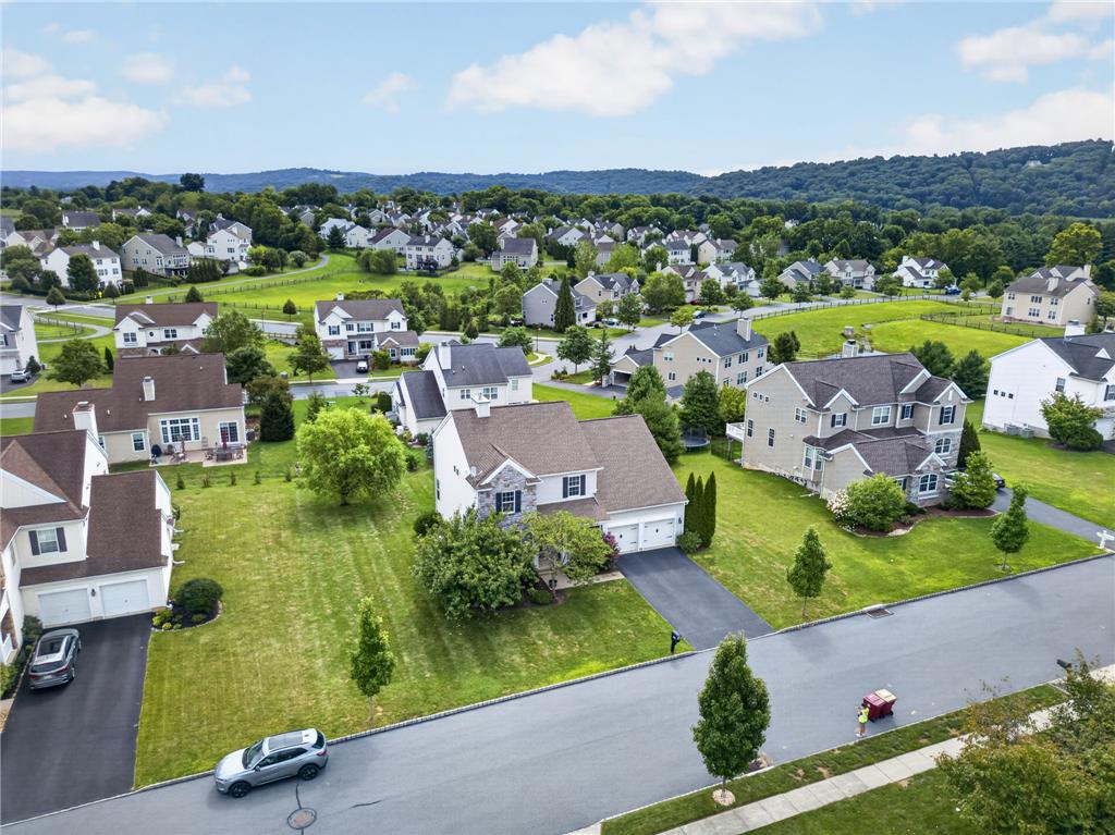 2765 Farmstead Road Easton, PA 18040 - Photo 49 of 50 An aerial perspective reveals a serene neighborhood nestled against a verdant, rolling landscape.