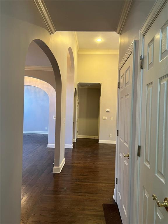 2476 Sewell Mill Road Marietta, GA 30062 - Photo 13 of 43 a view of hallway with livingroom and wooden floor