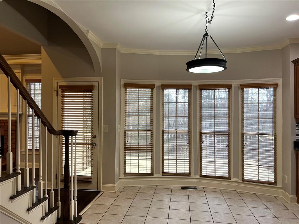 2476 Sewell Mill Road Marietta, GA 30062 - Photo 19 of 43 a view of an entryway with a chandelier