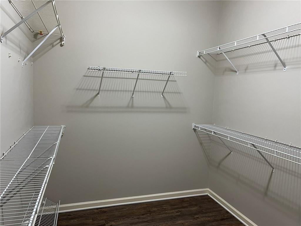 2476 Sewell Mill Road Marietta, GA 30062 - Photo 25 of 43 a view of a room with racks on the wall