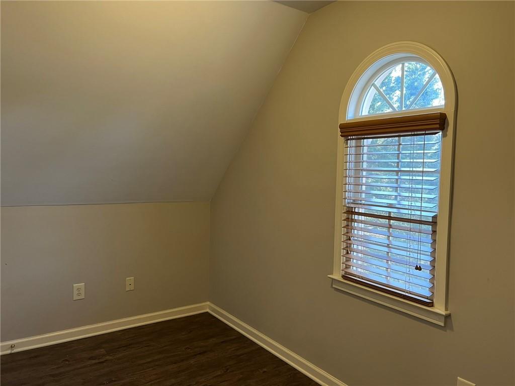 2476 Sewell Mill Road Marietta, GA 30062 - Photo 31 of 43 an empty room with a window
