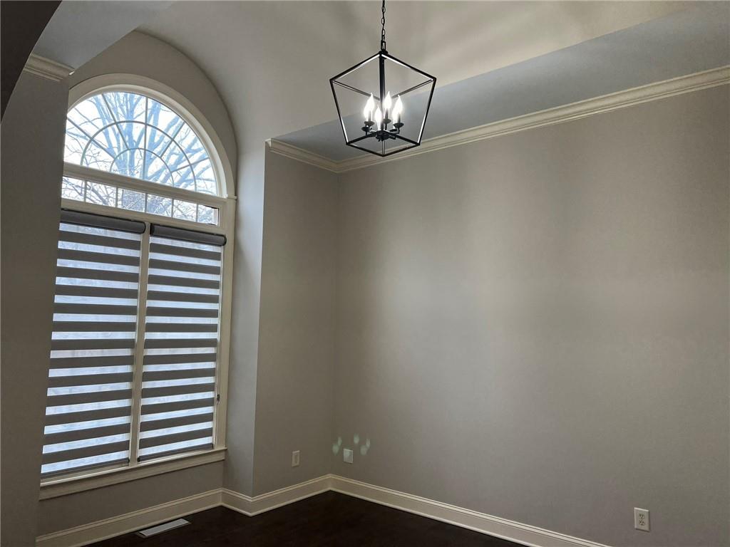 2476 Sewell Mill Road Marietta, GA 30062 - Photo 4 of 43 en empty room with a window