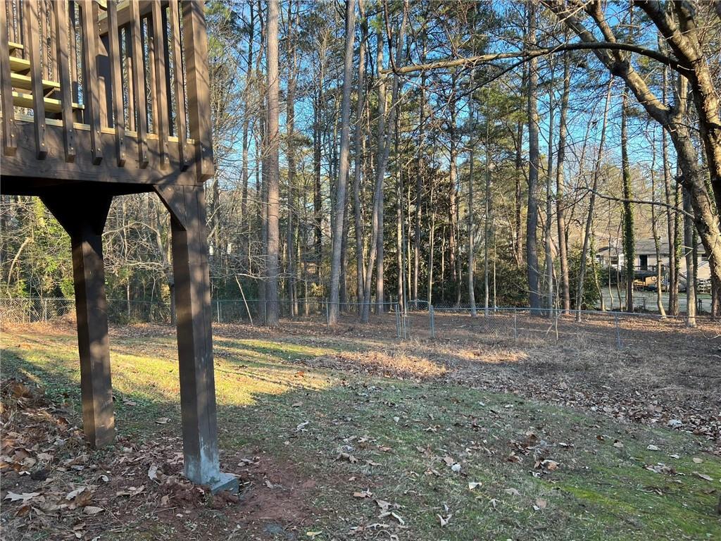 2476 Sewell Mill Road Marietta, GA 30062 - Photo 41 of 43 a view of a house with backyard and sitting area