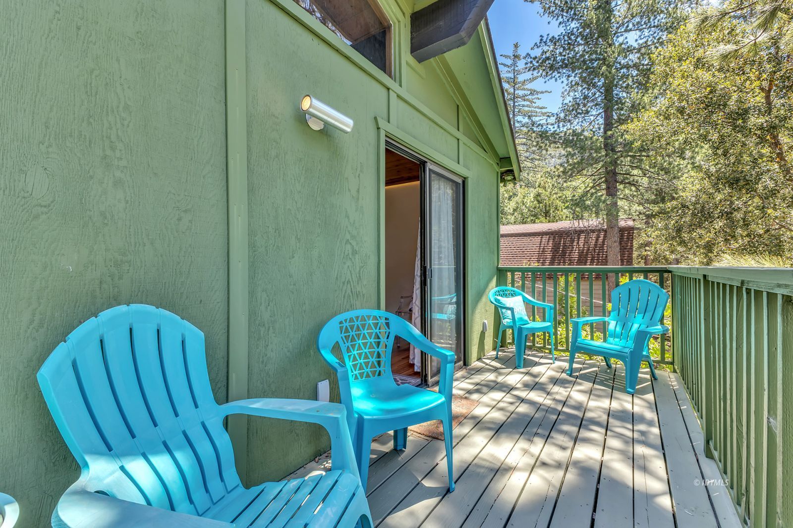 25595 Glen Road Idyllwild, CA 92549 - Photo 31 of 51 a view of balcony with two chairs and a potted plant
