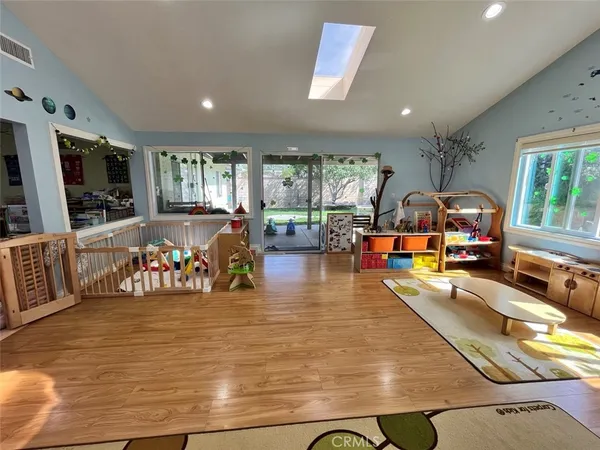 a view of a living room and dining room