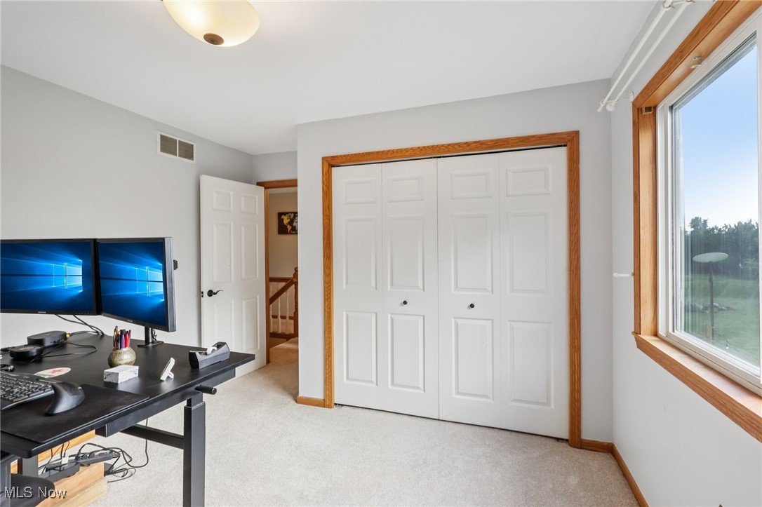 12881 Forest Road Burton, OH 44021 - Photo 38 of 48 Office/Bedroom with light carpet and baseboards