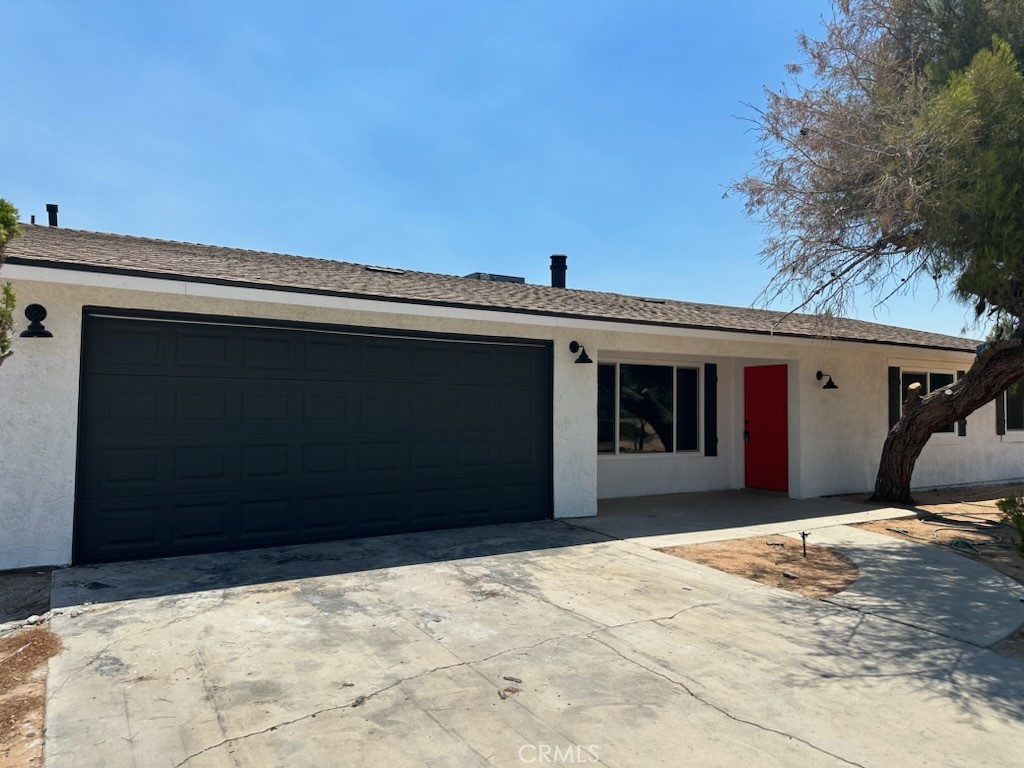 15019 Nanticoke Road Apple Valley, CA 92307 - Photo 1 of 1 a view of a house with a snow in the yard