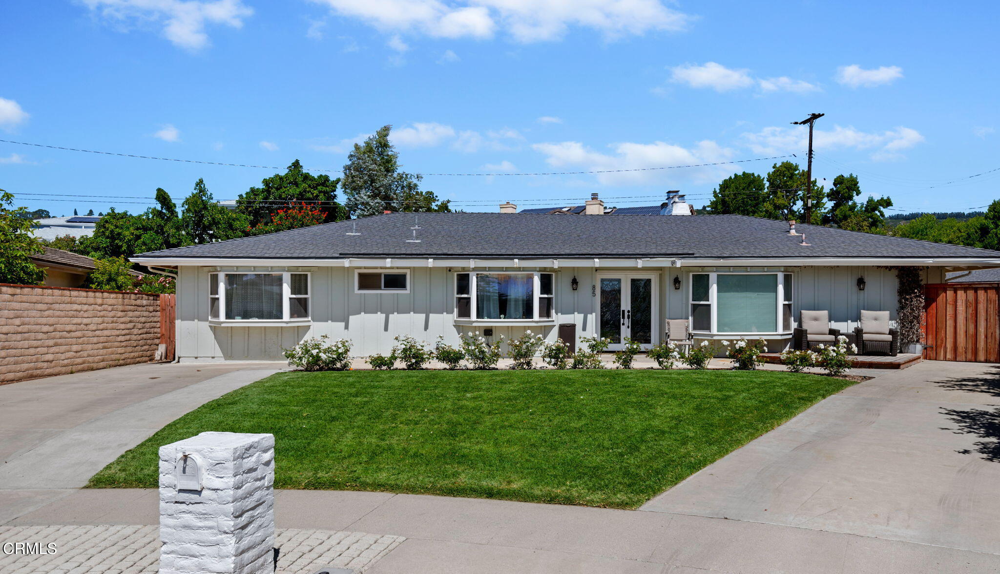 85 Norma Court Camarillo, CA 93010 - Photo 1 of 30 a front view of a house with a garden