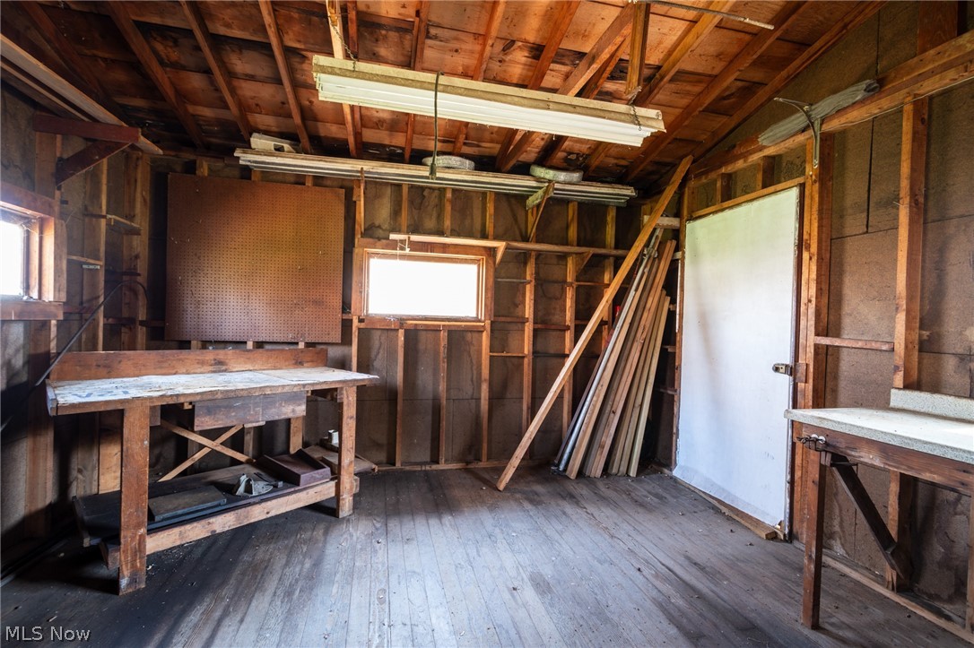 14027 Mayfield Road Huntsburg, OH 44046 - Photo 36 of 50 Interior space featuring exposed wood framing and wood-finish flooring