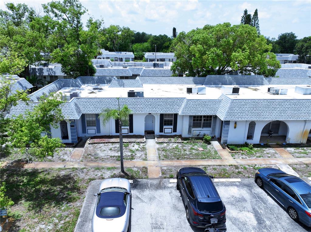 4227 Sheldon Place New Port Richey, FL 34652 - Photo 24 of 25 a view of a patio with couches chairs and a table