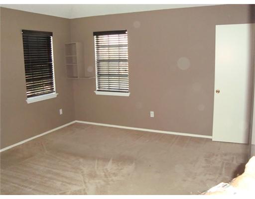 7921 Elk Drive Corpus Christi, TX 78414 - Photo 4 of 7 a view of an empty room with a window