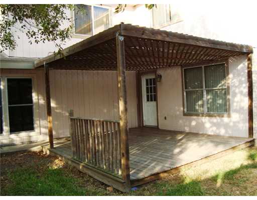 7921 Elk Drive Corpus Christi, TX 78414 - Photo 7 of 7 a view of a house with wooden fence