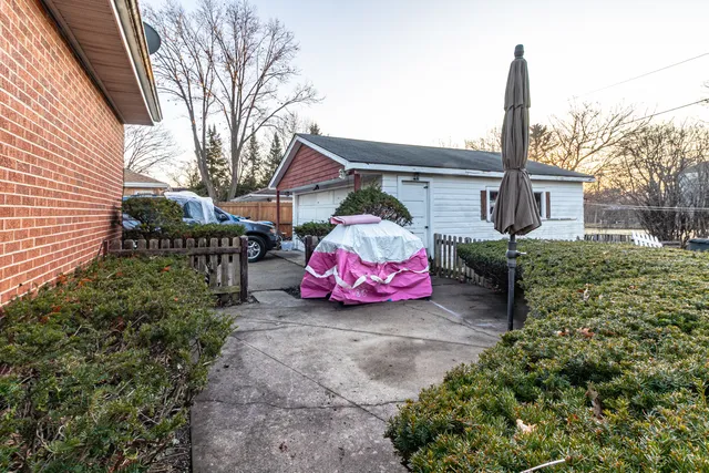 a house view with a garden space