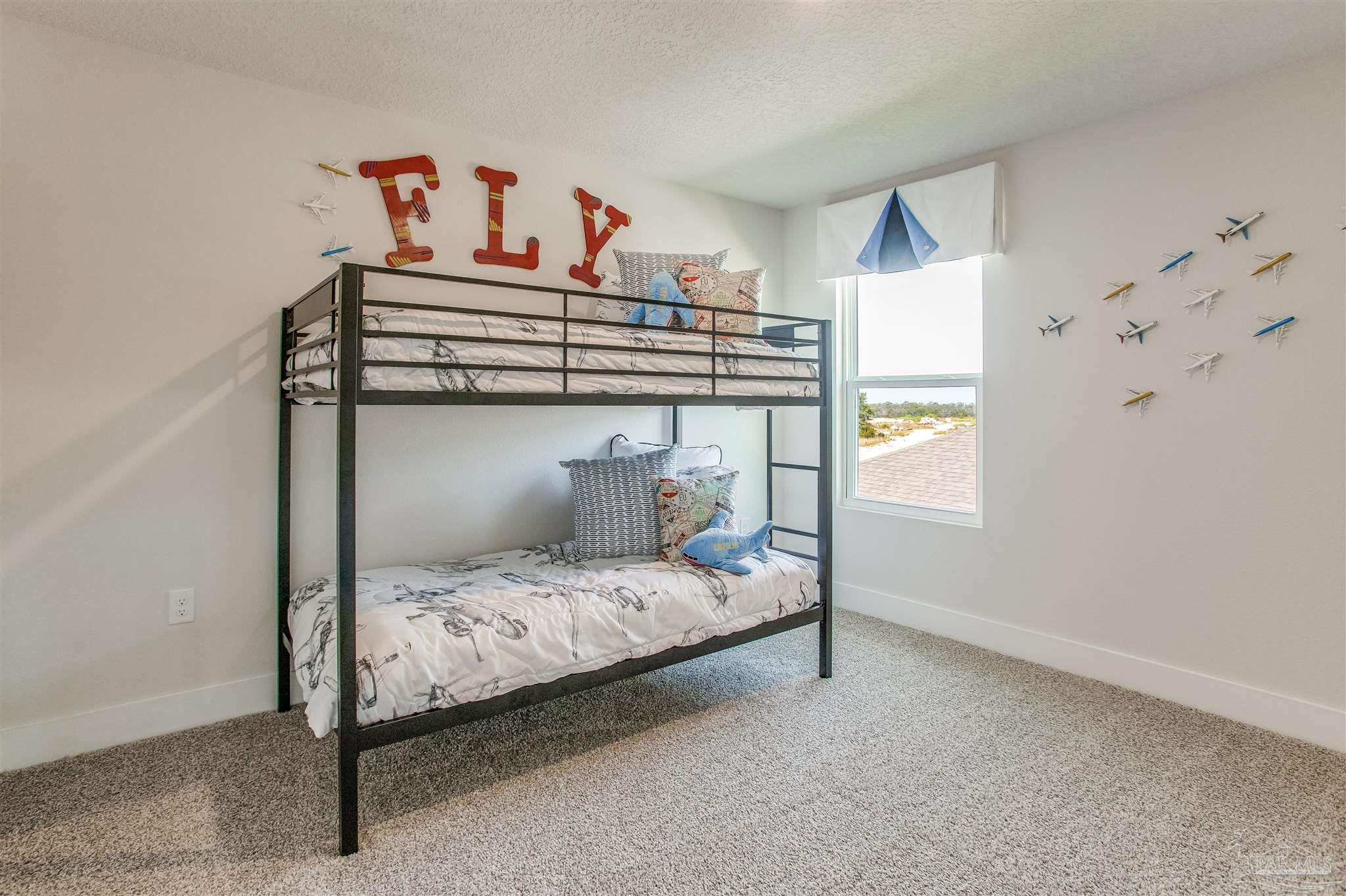 3459 Crossvine Road Cantonment, FL 32533 - Photo 24 of 38 a bedroom with a bed and a window