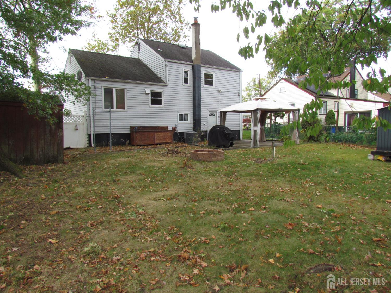 10 Willow Avenue Edison, NJ 08817 - Photo 15 of 17 a view of a house with a yard
