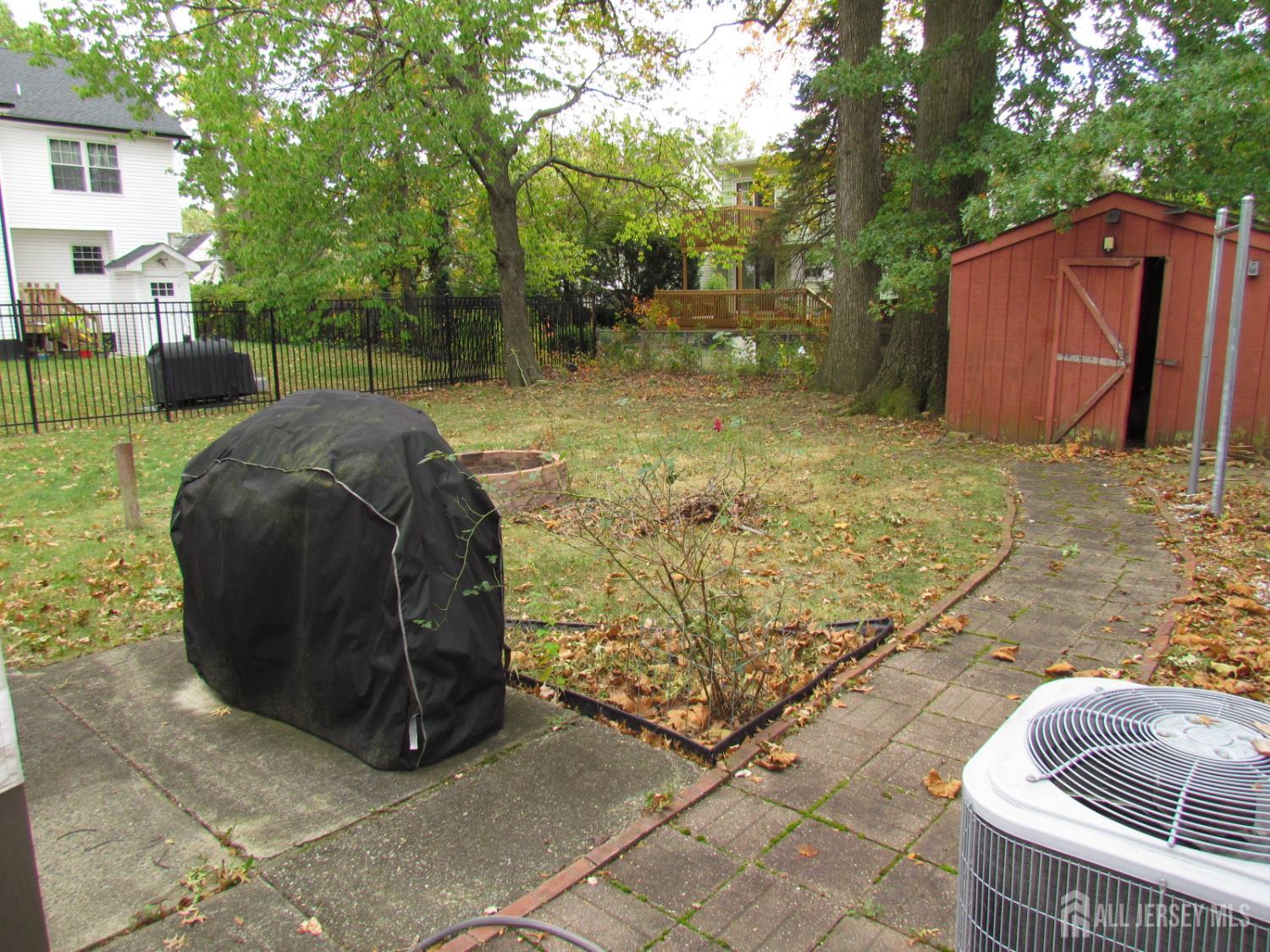 10 Willow Avenue Edison, NJ 08817 - Photo 16 of 17 a view of backyard with outdoor seating