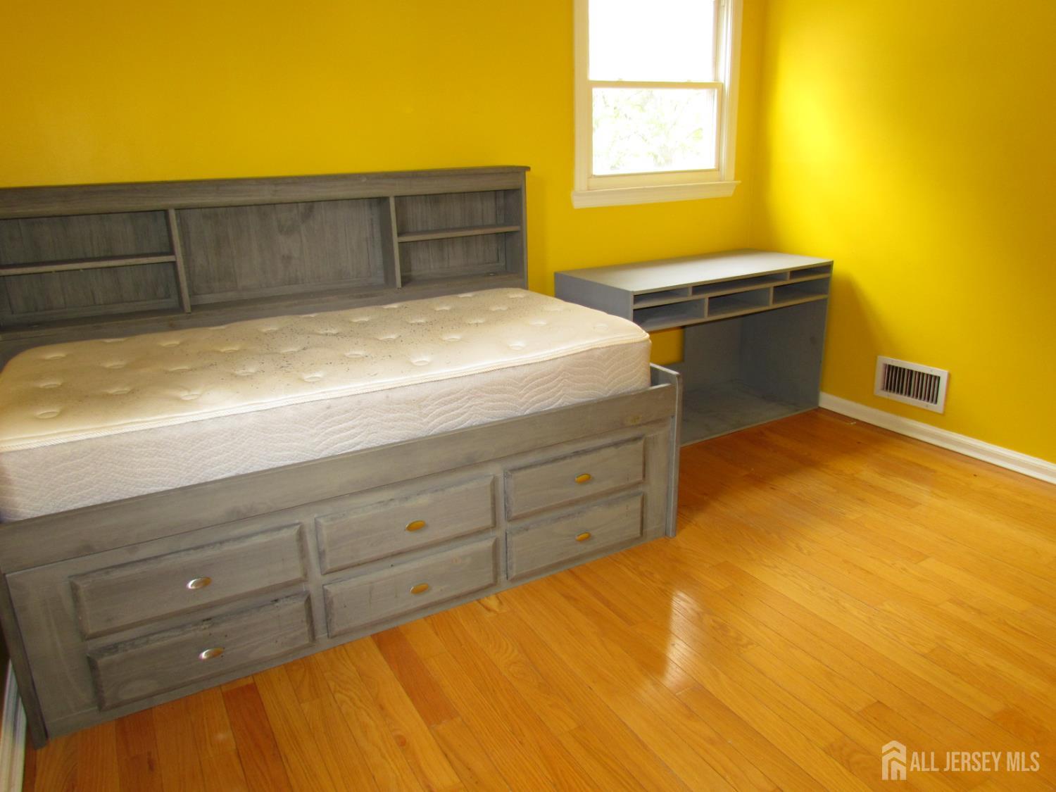 10 Willow Avenue Edison, NJ 08817 - Photo 9 of 17 a view of a room with cabinet