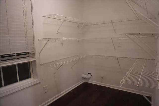 a view of a room with racks on the wall