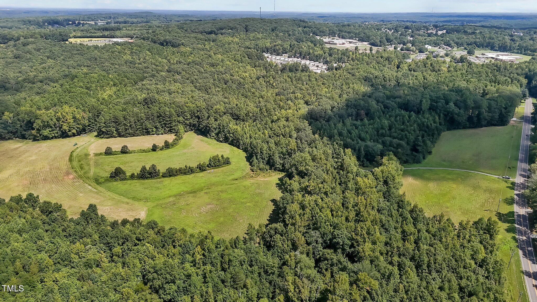 45-acres Hurdle Mills Road Roxboro, NC 27573 - Photo 1 of 25 7-web-or-mls-DJI_20240819120123_0664_D