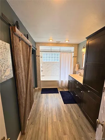 a view of a kitchen from the stairs