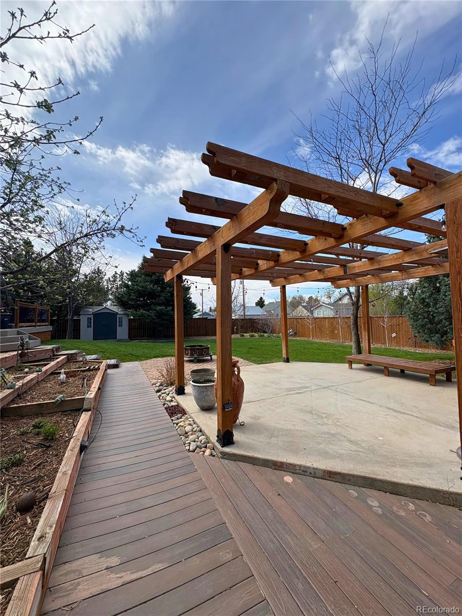 323 Fairview Street Otis, CO 80743 - Photo 31 of 38 a view of a backyard with wooden floor