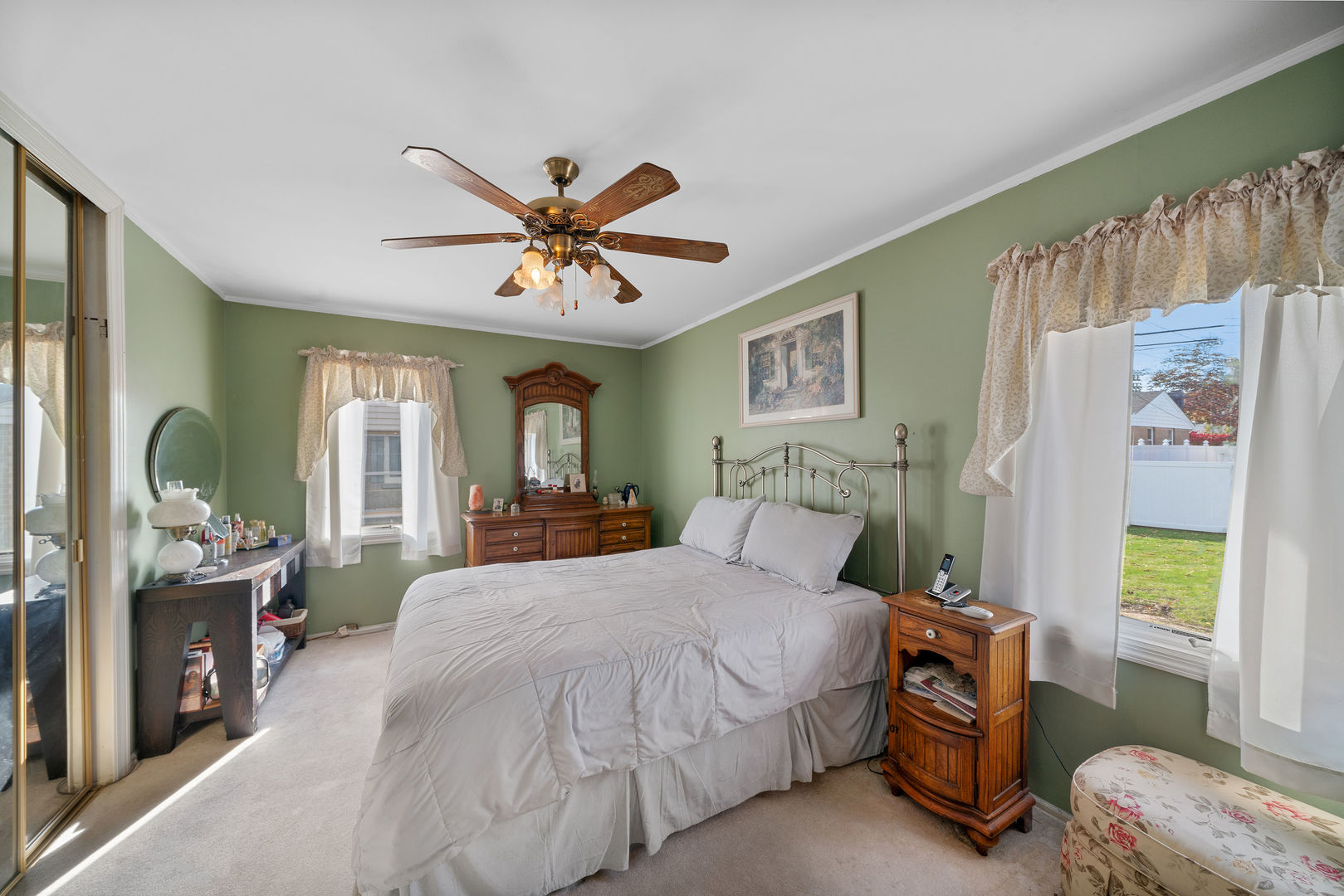 1500 Harding Avenue Berkeley, IL 60163 - Photo 18 of 22 a bedroom with a bed and a chandelier