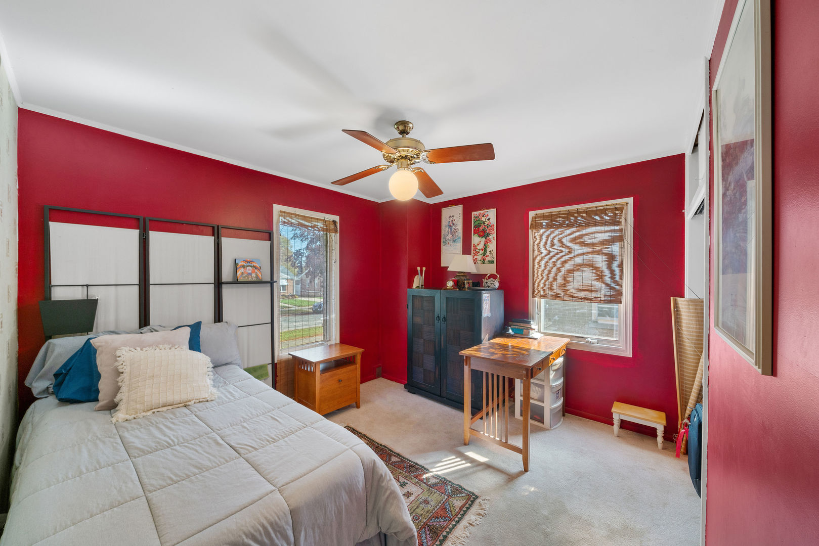 1500 Harding Avenue Berkeley, IL 60163 - Photo 19 of 22 a bedroom with a bed and a chandelier