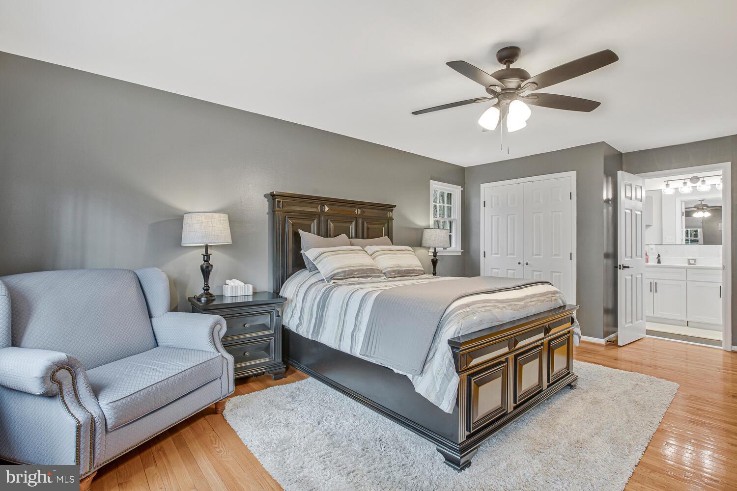 1505 Pinnacle Road Towson, MD 21286 - Photo 19 of 34 a spacious bedroom with a bed couch and window