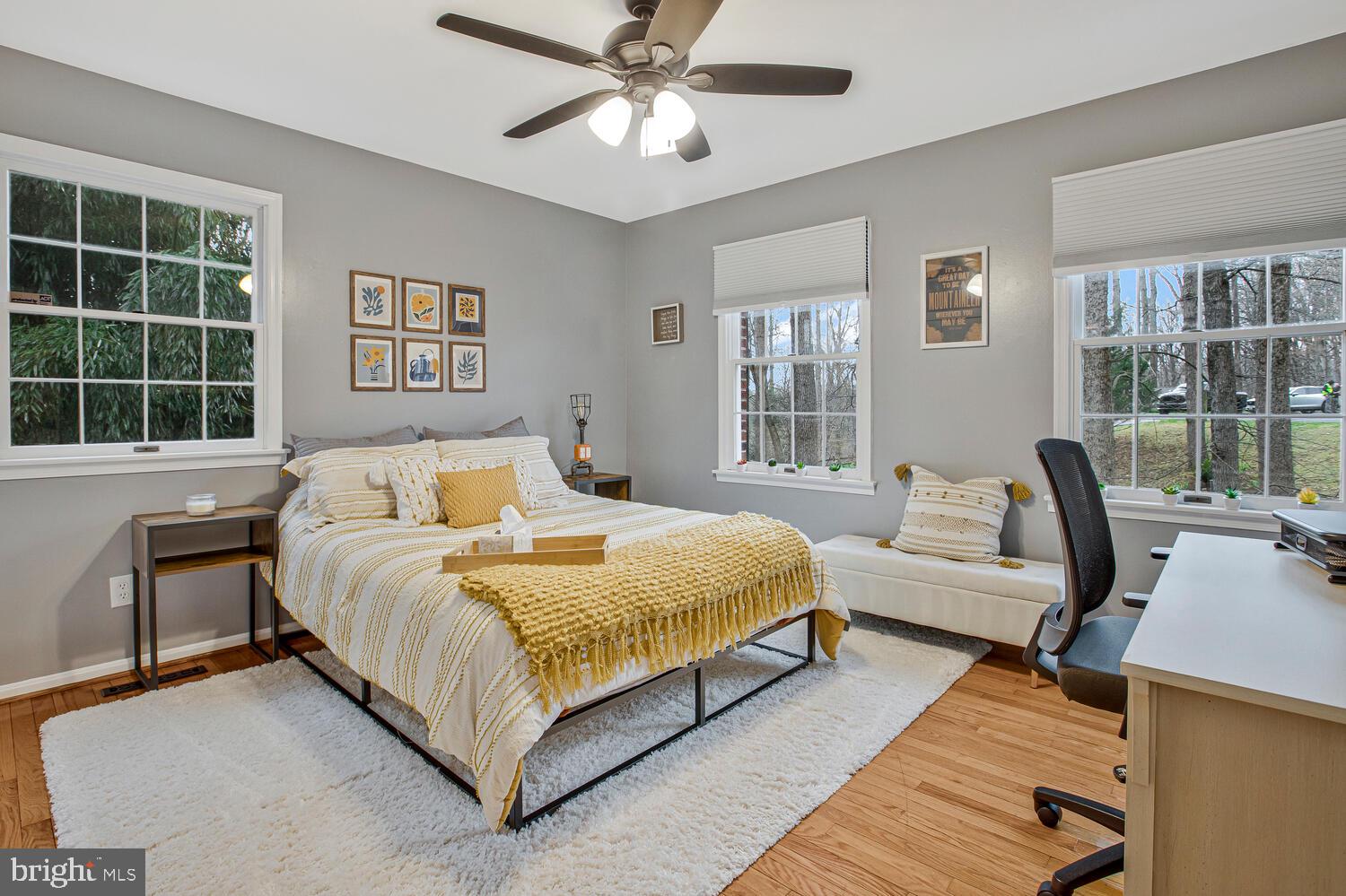1505 Pinnacle Road Towson, MD 21286 - Photo 20 of 34 a bedroom with a bed wooden floor and window