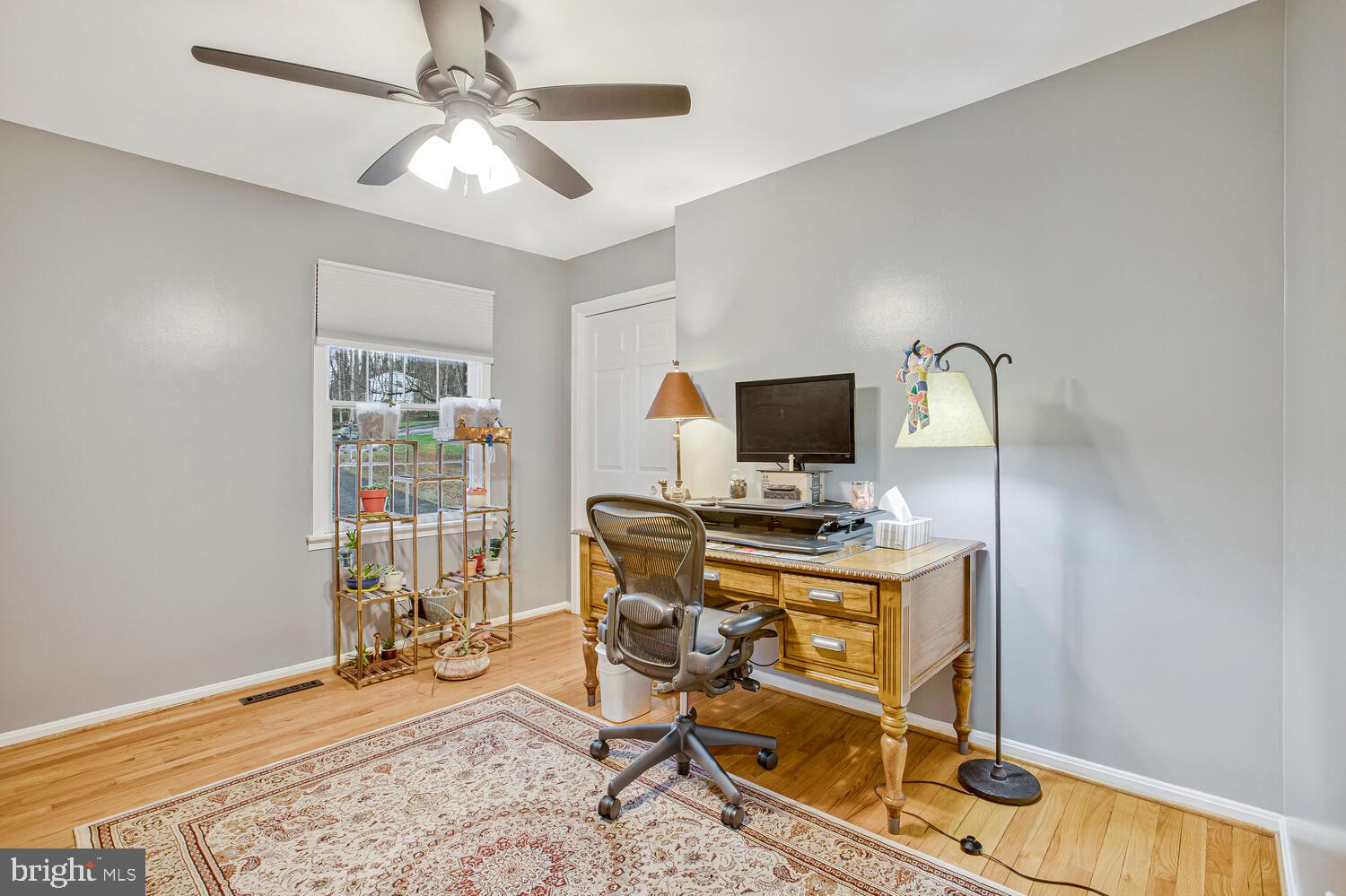 1505 Pinnacle Road Towson, MD 21286 - Photo 24 of 34 a view of a workspace with furniture and a window