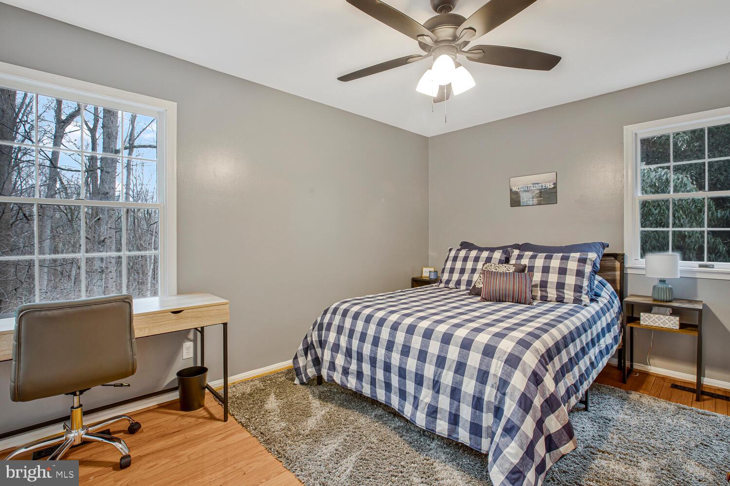 1505 Pinnacle Road Towson, MD 21286 - Photo 25 of 34 a bedroom with a bed and a desk