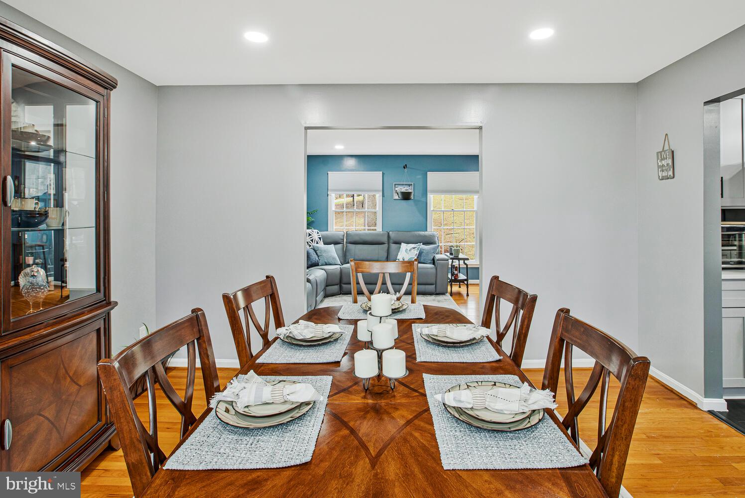1505 Pinnacle Road Towson, MD 21286 - Photo 8 of 34 a dining room with furniture and wooden floor
