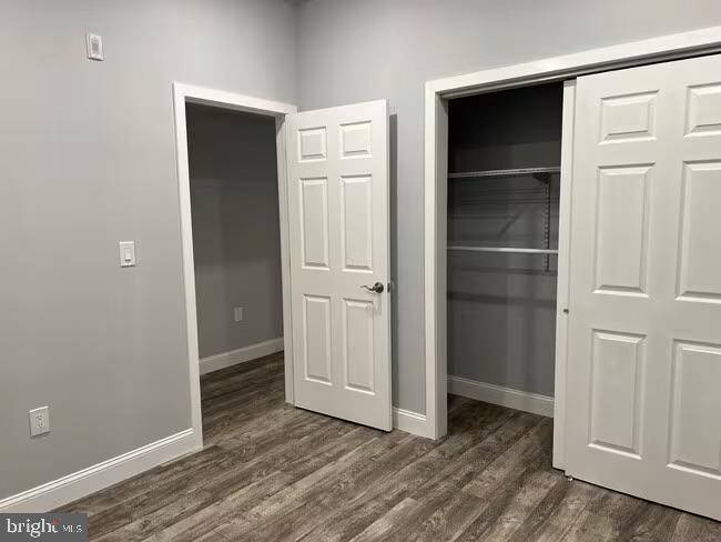 1237 Lancaster Avenue, Unit 1 Berwyn, PA 19312 - Photo 14 of 17 an empty room with wooden floor and closet