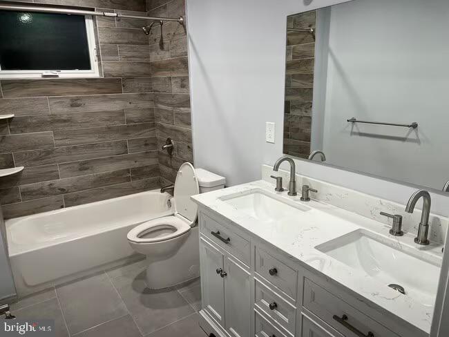 1237 Lancaster Avenue, Unit 1 Berwyn, PA 19312 - Photo 15 of 17 a bathroom with a sink a toilet and bathtub