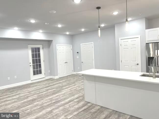 1237 Lancaster Avenue, Unit 1 Berwyn, PA 19312 - Photo 3 of 17 a bathroom with a sink a vanity and a shower