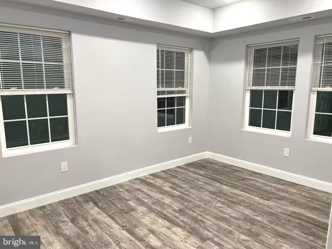 1237 Lancaster Avenue, Unit 1 Berwyn, PA 19312 - Photo 7 of 17 a view of empty room with windows