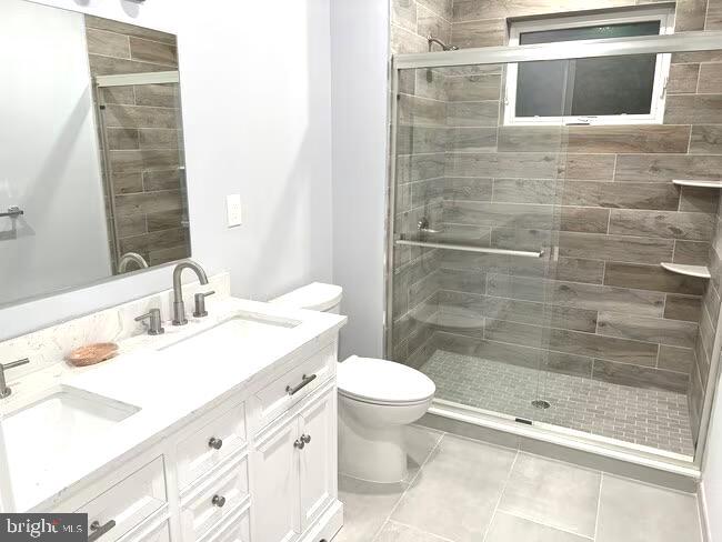 1237 Lancaster Avenue, Unit 1 Berwyn, PA 19312 - Photo 8 of 17 a bathroom with a sink and a mirror