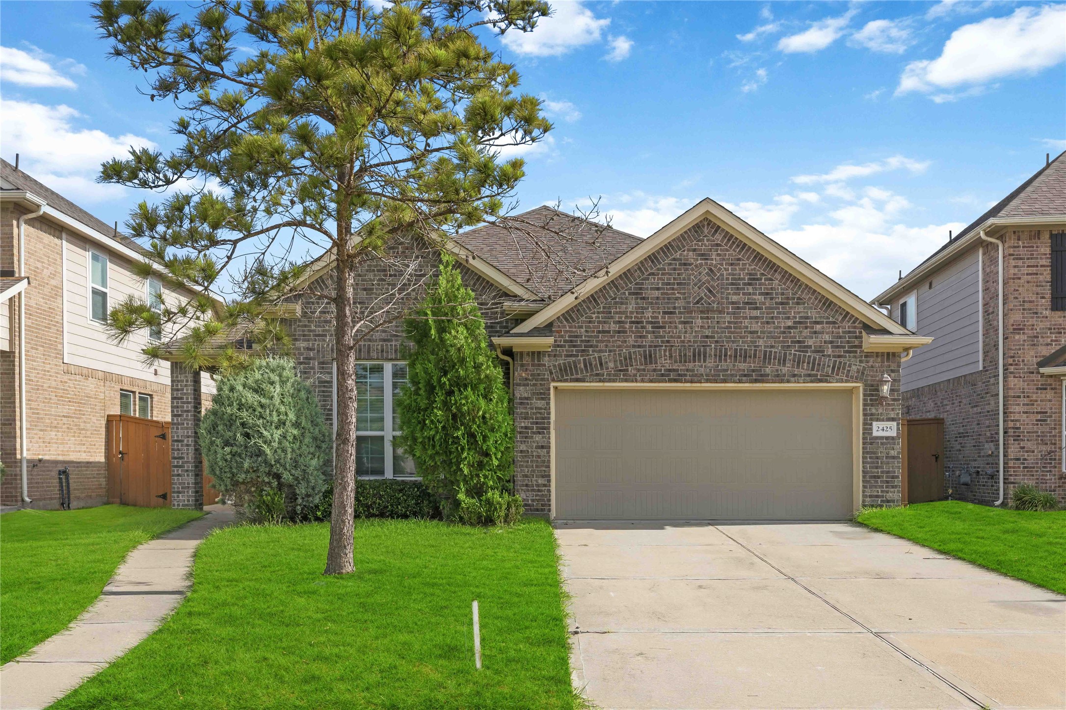 2425 Temple Crag Drive Rosharon, TX 77583 - Photo 2 of 32 Charming curb appeal, fresh landscaping, and a welcoming front elevation you'll be proud to call home.