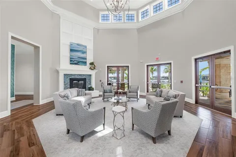 a room with gym equipment and large mirror