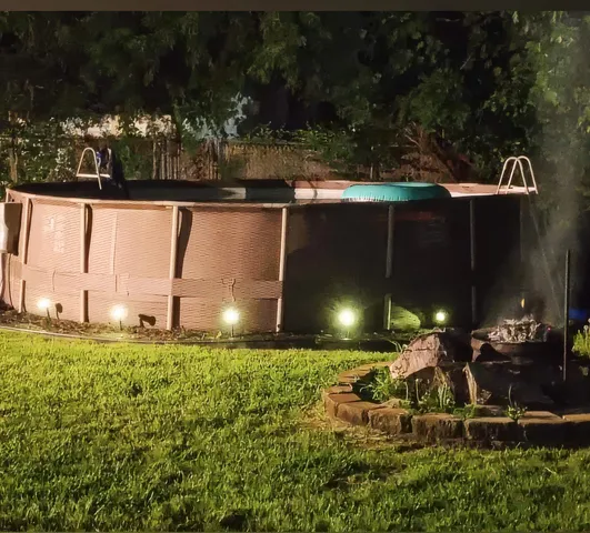 a backyard of a house with lots of green space