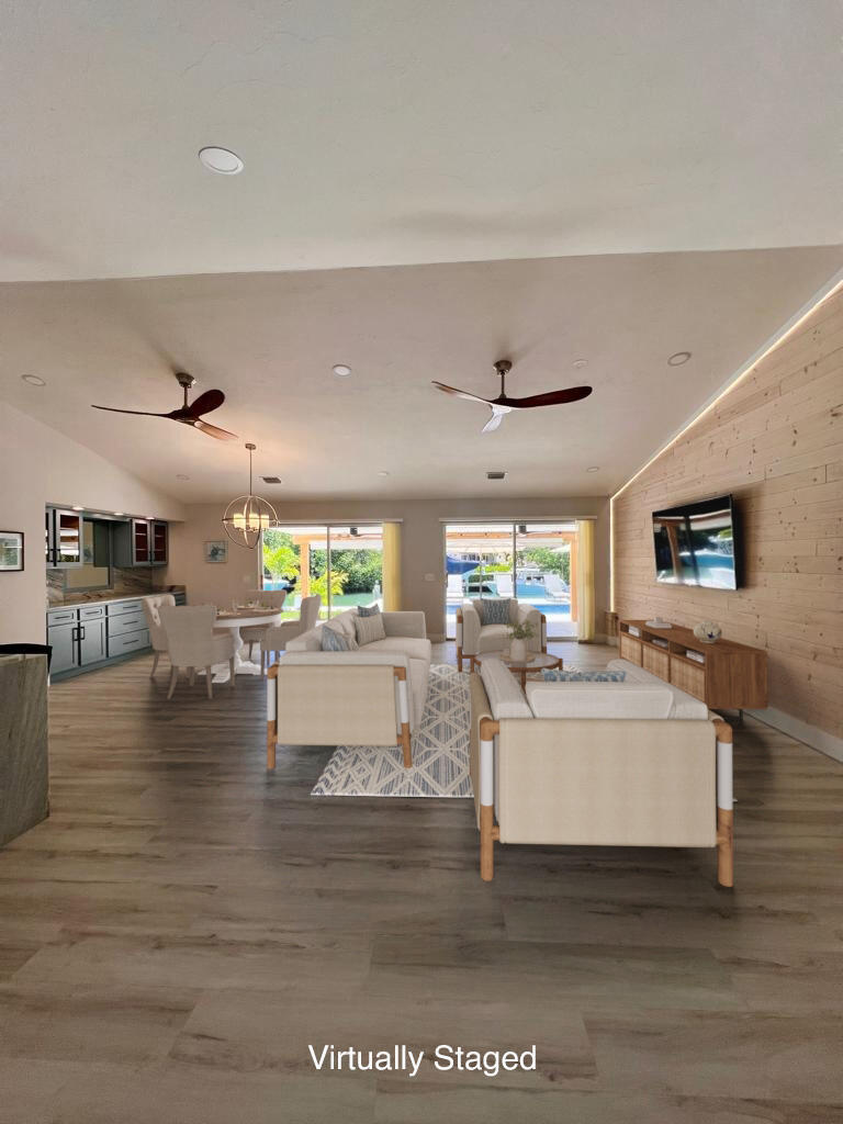 641 12th Street Key Colony Beach, FL 33051 - Photo 11 of 45 a living room with fireplace furniture and a wooden floor